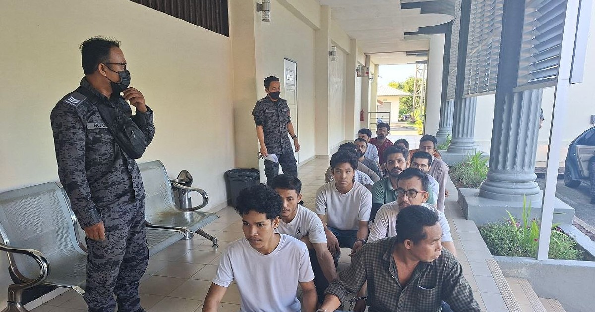 Fourteen Foreigners Face Court Charges for Illegal Entry and Overstaying in Malaysia