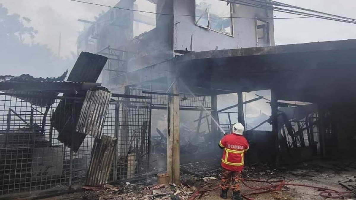 Man accused of burning mother's home held for further questioning