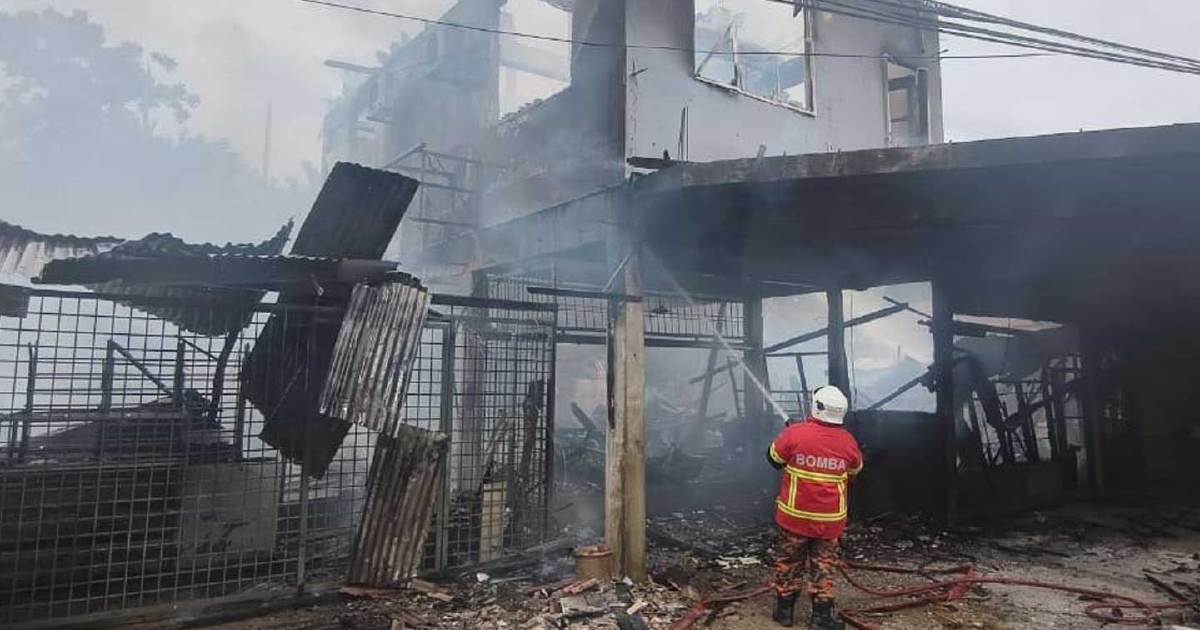 Man accused of burning mother's home held for further questioning