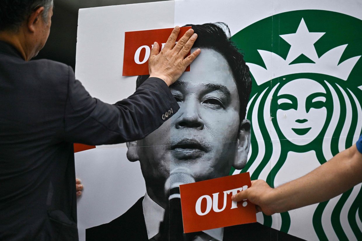 South Korean police question Starbucks executive over insensitive 'Tank Day' promotion disaster