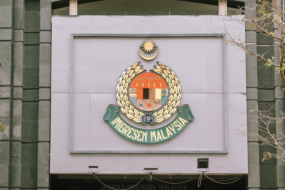 Immigration Department dismantles passport forgery ring in Kuala Lumpur, arrests three and seizes 119 counterfeit documents