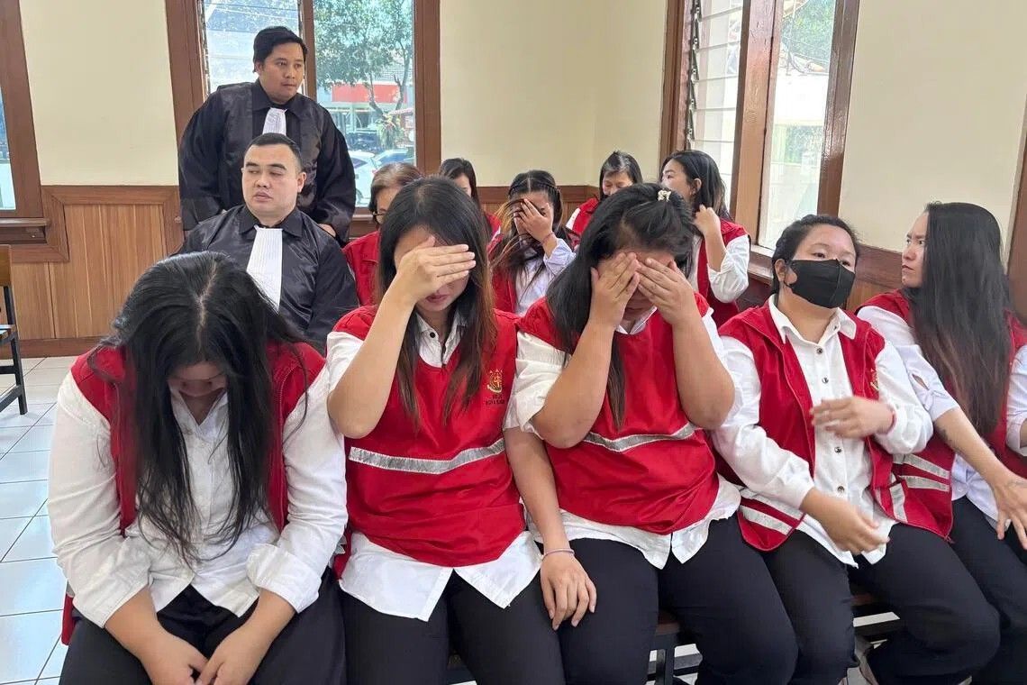 Indonesian court convicts all 19 members of baby-smuggling ring that trafficked infants to Singapore