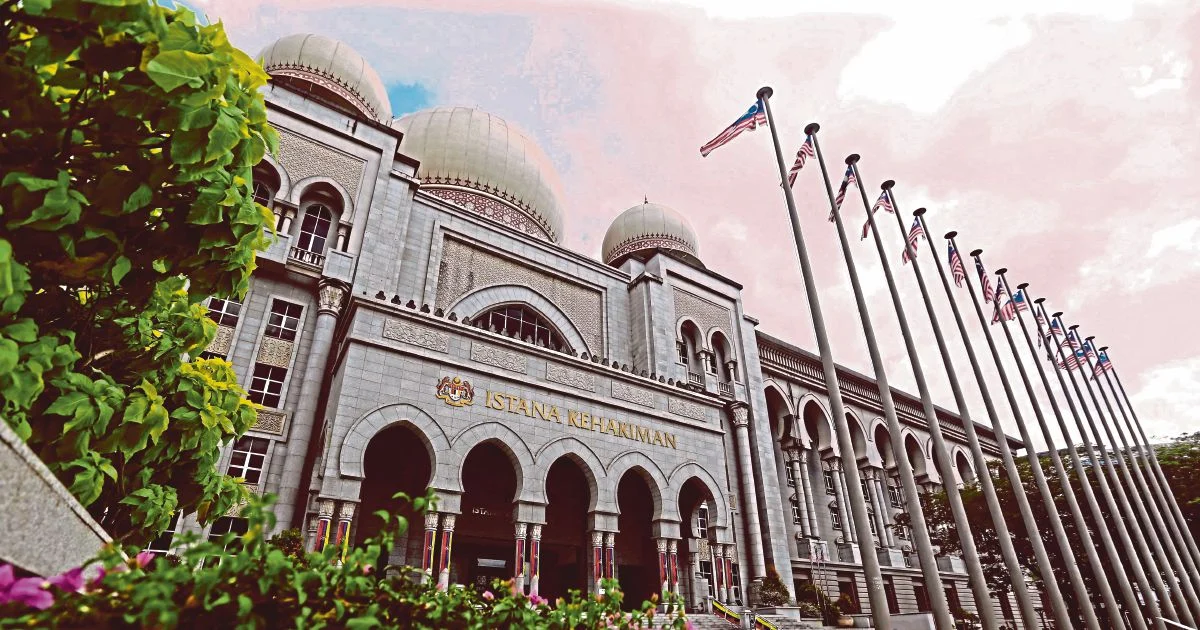 Former Felda chief's corruption conviction faces judicial review as ex-army general's money laundering trial continues