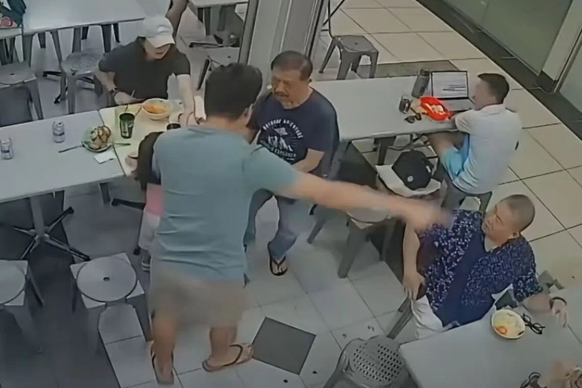 Singapore police investigate incident after elderly man pushed to ground for patting girl's head at coffee shop