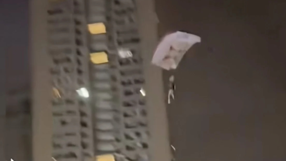 Chinese Man Detained After Illegal Rooftop Skydive Stunt Over Residential Area