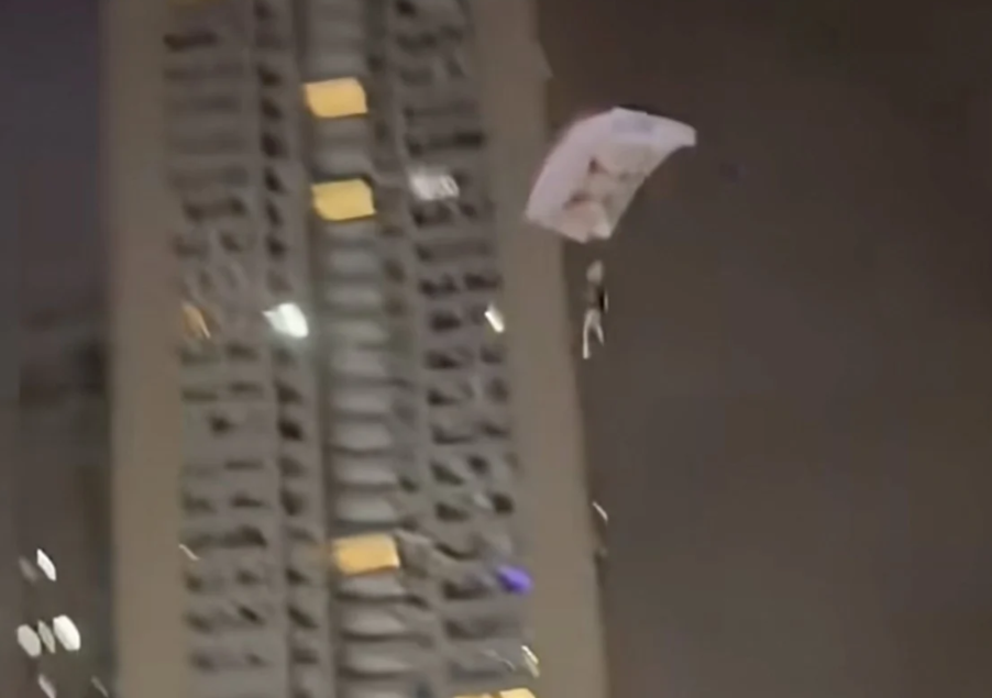 Chinese Man Detained After Illegal Rooftop Skydive Stunt Over Residential Area
