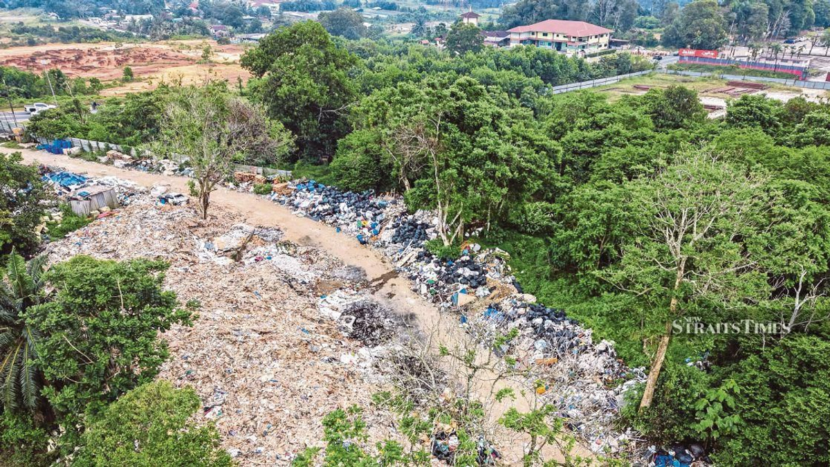 Johor launches multi-agency probe into suspected Singapore construction waste dumping in Pontian