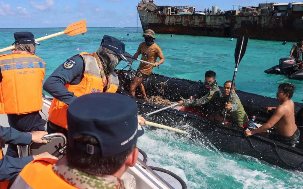 China Summons Philippine Envoy After South China Sea Clash; US Backs Manila