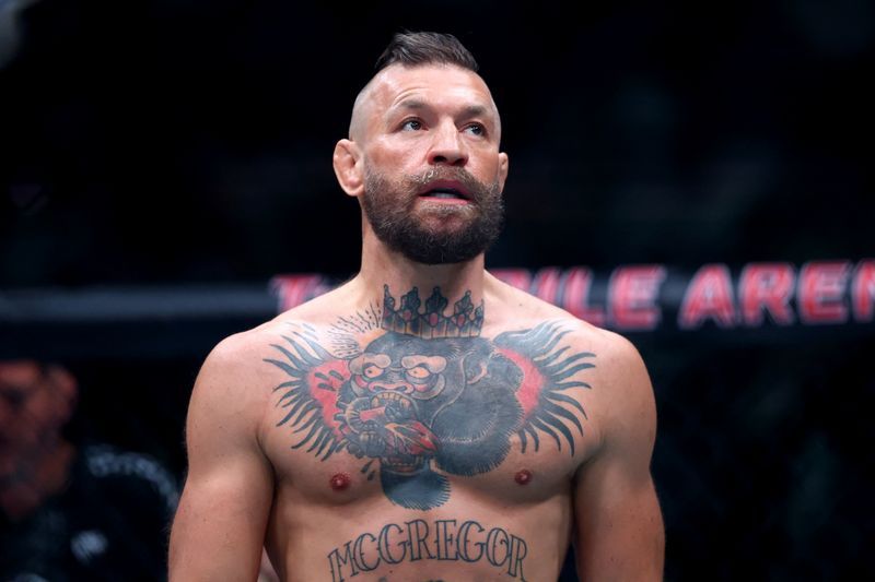 McGregor's UFC Comeback Derailed Within 60 Seconds by Knee Injury at UFC 329
