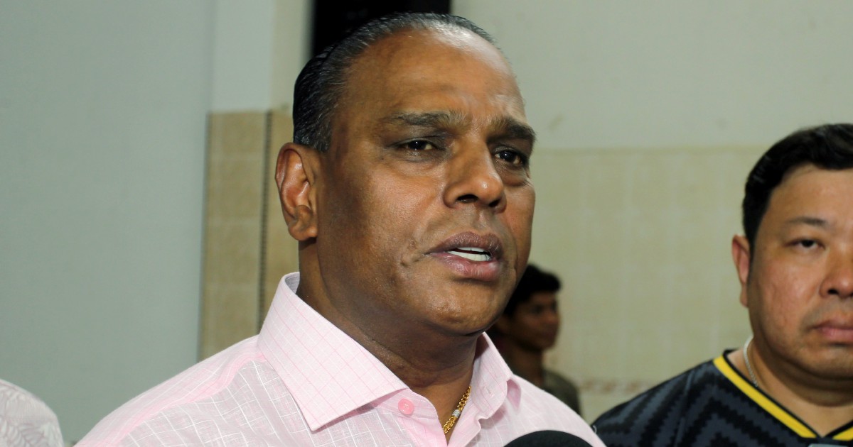 Black-clad supporters rally as ex-HR minister Saravanan faces corruption charges