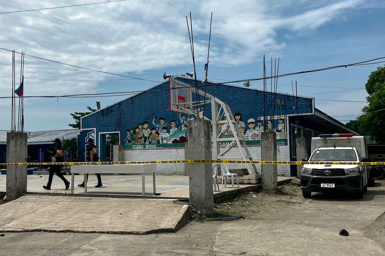 Two teenage students arrested after shooting rampage at Philippine high school kills three classmates