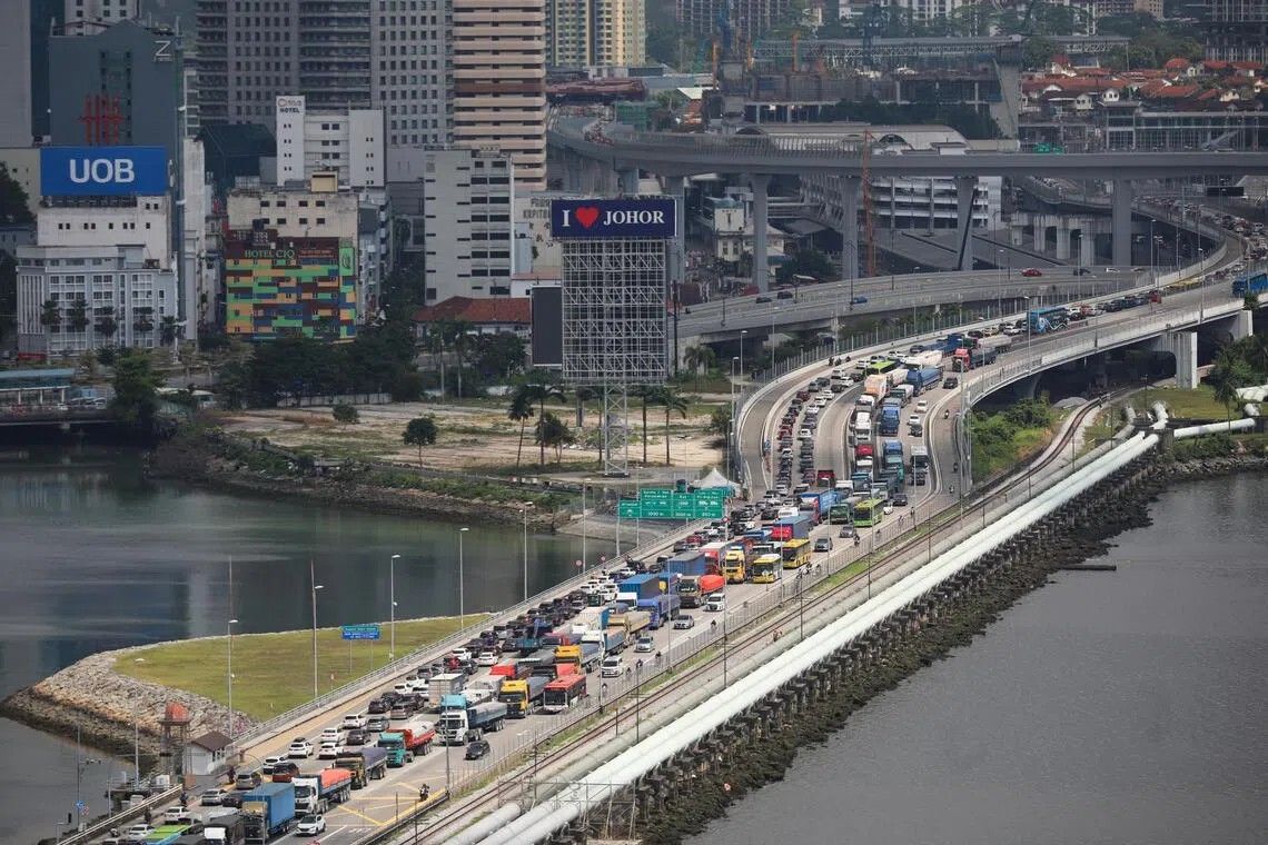 Singapore braces for gridlock at border checkpoints during National Day weekend as authorities urge advance planning