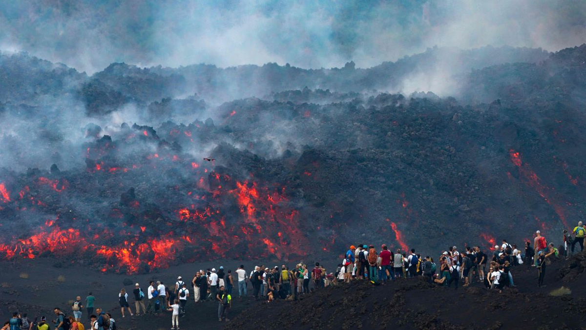 Mount Etna's dramatic eruption draws crowds of thrill-seeking tourists despite safety risks
