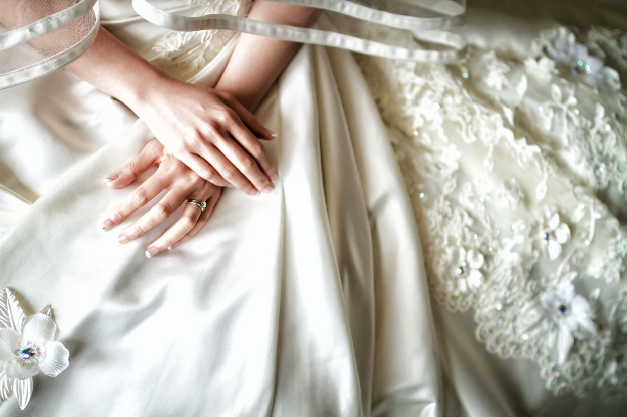 The Emotional Weight of Letting Go: Why Wedding Dresses Hold Such Power Over Us