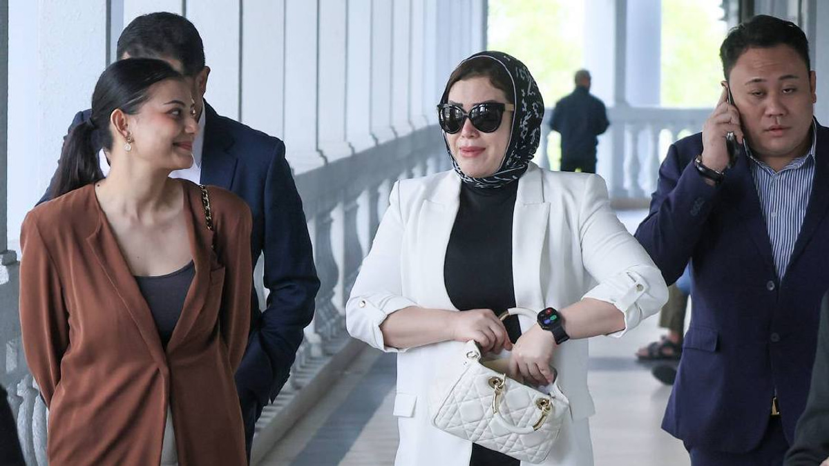 Zizie Izette cleared of corruption charges linked to late husband Bung Moktar's Felcra case