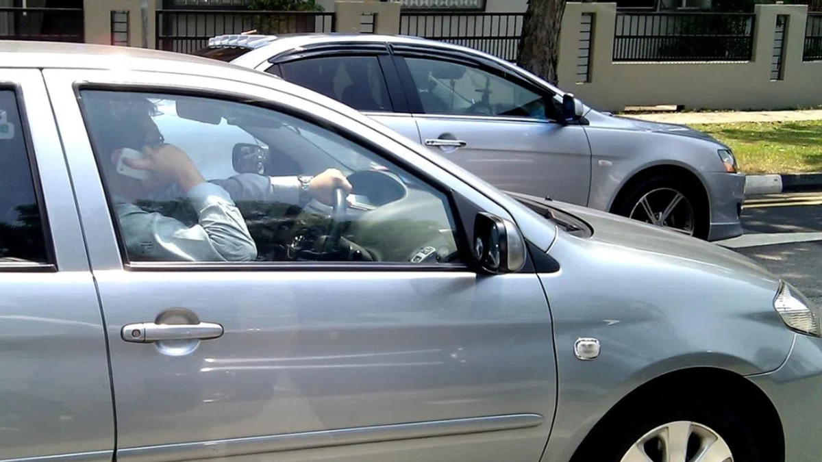 Singapore Tightens Phone-Driving Laws: Mere Possession Now Criminal as Road Deaths Surge