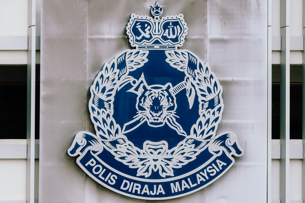 Three arrested after woman attacked in Kuala Lumpur parking dispute